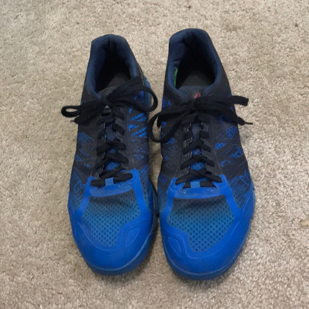 Reebok blue and black shoes.